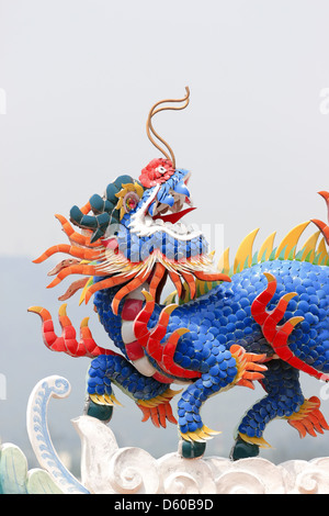 Chinese dragon statue in a temple,Chinese sculpture in Thailand. Stock Photo