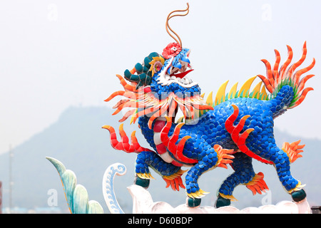 Chinese dragon statue in a temple,Chinese sculpture in Thailand. Stock Photo