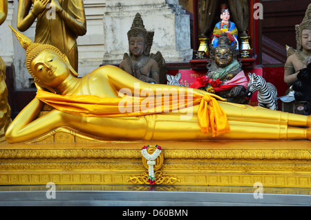 Reclining gold Buddha Thailand, Southeast Asia Stock Photo
