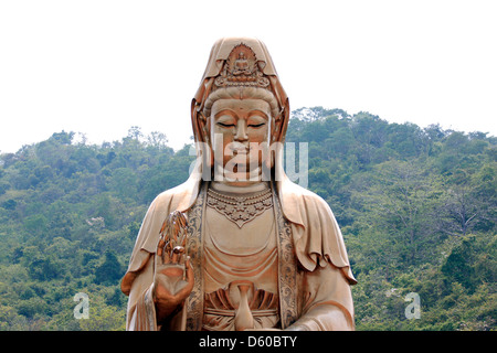 The Chinese deities sculpture of Guan Yin,Made of brass. Stock Photo