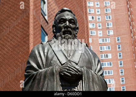 Statue of Confucius, Confucius Plaza, Chinatown, Manhattan, New York City, New York, USA - Image taken from public ground Stock Photo