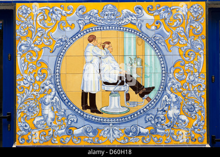 Colourful ceramic tiles of hairdressers shopfront, Madrid, Spain Stock Photo