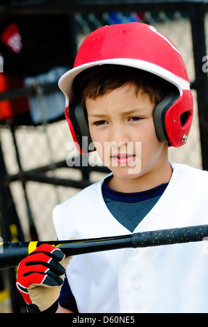 Up-close shot of little league baseball boy about to bat. Stock Photo