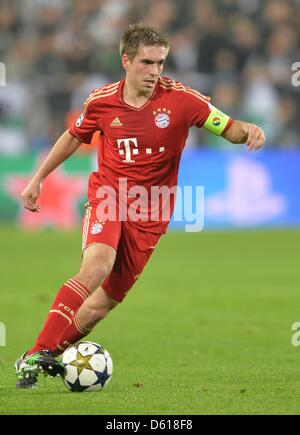 Turin, Italy. 10th April 2013. Munich's Philipp Lahm runs with the ball during the UEFA Champions League quarter final second leg soccer match between Juventus Turin and FC Bayern Munich at Juventus Stadium in Turin, Italy, 10 April 2013. Photo: Andreas Gebert/dpa/Alamy Live News Stock Photo