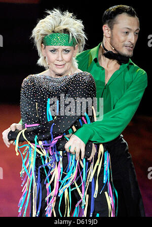 FILE - A file photo dated 14 March 2012 shows Danish singer Gitte Haenning and dancing professional Gennady Bondarenko standing on stage during the dancing show 'Let's Dance' of private broadcaster RTL at the Coloneum in Cologne, Germany. Haenning (65) left the show after her sister Jette died on 01 April 2012, RTL reported on 10 April 2012. Photo: Henning Kaiser Stock Photo