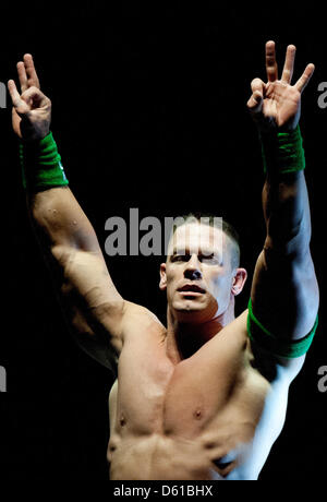 US-wrestler John Cena cheers during a fight at the RAW WrestleMania Revenge Tour at the o2 World canue in Berlin, Germany, 14 April 2012. The WWE (World Wrestling Entertainment) celebrates its 20th German anniversary this April. The first show in Germany was staged in Kiel, Germany, in April 1992. Photo: Sebastian Kahnert Stock Photo