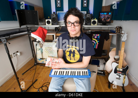 Get Cape. Wear Cape. Fly, English music artist Sam Duckworth photographed at home in Bow, East London, England, United Kingdom. Stock Photo