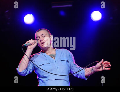 Irish singer song-writer  Sinéad O'Connor stands on stage as she performs during her concert at the Astra Kulturhaus venue in Berlin, Germany, 19 April 2012. O'Connor will continuer her tour with one more German concert in Munich. Photo: Britta Pedersen Stock Photo