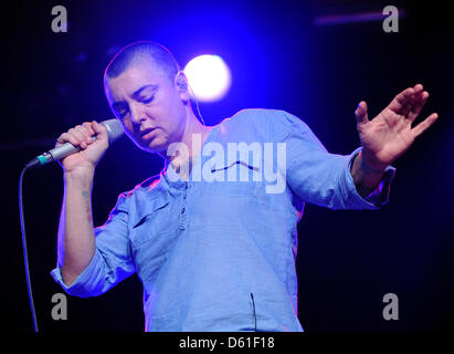 Irish singer song-writer  Sinéad O'Connor stands on stage as she performs during her concert at the Astra Kulturhaus venue in Berlin, Germany, 19 April 2012. O'Connor will continuer her tour with one more German concert in Munich. Photo: Britta Pedersen Stock Photo