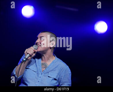 Irish singer song-writer  Sinéad O'Connor stands on stage as she performs during her concert at the Astra Kulturhaus venue in Berlin, Germany, 19 April 2012. O'Connor will continuer her tour with one more German concert in Munich. Photo: Britta Pedersen Stock Photo