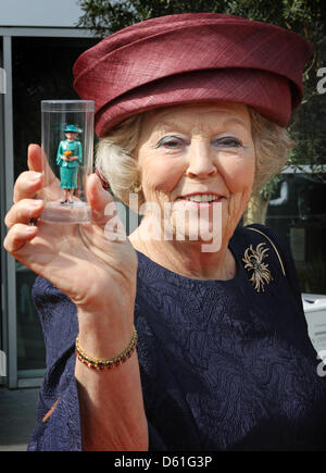 Queen Beatrix of The Netherlands opens the renewed miniature park Madurodam in The Hague, The Netherlands, 21 April 2012. She received a miniature of herself. Madorudam park has now interactive miniatures of Dutch buildings and cities. Photo: Patrick van Katwijk / NETHERLANDS OUT Stock Photo