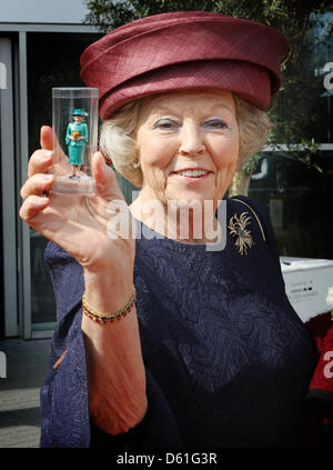 Queen Beatrix of The Netherlands opens the renewed miniature park Madurodam in The Hague, The Netherlands, 21 April 2012. She received a miniature of herself. Madorudam park has now interactive miniatures of Dutch buildings and cities. Photo: Patrick van Katwijk / NETHERLANDS OUT Stock Photo