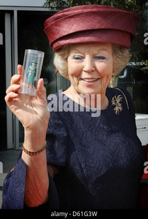 Queen Beatrix of The Netherlands opens the renewed miniature park Madurodam in The Hague, The Netherlands, 21 April 2012. She received a miniature of herself. Madorudam park has now interactive miniatures of Dutch buildings and cities. Photo: Patrick van Katwijk / NETHERLANDS OUT Stock Photo