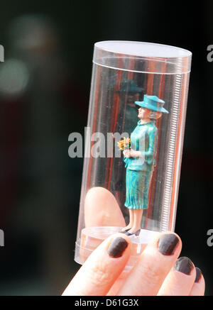 Queen Beatrix of The Netherlands opens the renewed miniature park Madurodam in The Hague, The Netherlands, 21 April 2012. She received a miniature of herself. Madorudam park has now interactive miniatures of Dutch buildings and cities. Photo: Patrick van Katwijk / NETHERLANDS OUT Stock Photo