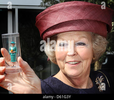 Queen Beatrix of The Netherlands opens the renewed miniature park Madurodam in The Hague, The Netherlands, 21 April 2012. She received a miniature of herself. Madorudam park has now interactive miniatures of Dutch buildings and cities. Photo: Patrick van Katwijk / NETHERLANDS OUT Stock Photo