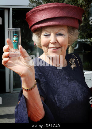 Queen Beatrix of The Netherlands opens the renewed miniature park Madurodam in The Hague, The Netherlands, 21 April 2012. She received a miniature of herself. Madorudam park has now interactive miniatures of Dutch buildings and cities. Photo: Patrick van Katwijk / NETHERLANDS OUT Stock Photo