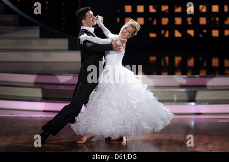 Singer Stefanie Hertel and dancer Sergiy Plyuta perform on stage during RTL television dance show 'Let's Dance' in Cologne, Germany, 25 April 2012. Six stars ventured into the fifth episode of season five with their dance partners on the dance floor. Photo: Rolf Vennenbernd Stock Photo