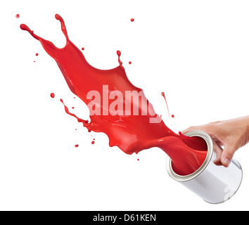 pouring red paint from its bucket creating splash Stock Photo