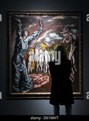 A visitor stands in front of the painting 'The opening of the fifth seal' by Spanish painter El Greco at the Museum Kunst Palast in Dusseldorf, Germany on April 26, 2012. Under the title 'El Greco and modern', the Museum Kunst Palast in Düsseldorf, exhibits from this Saturday (April 28, 2012) until 12 August more than 40 works of the Spanish master. Photo: Caroline Seidel dpa / LNW Stock Photo