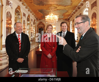 Premier of Brandenburg Matthias Platzeck (SPD, R), Prince Georg Friedrich of Prussia (2-R), Princess Sophie of Prussia and State Minister for Culture Bernd Neumann visit the hall of mirrors at the new exhibition 'Frederisk' about Frederick the Great in front of the New Palace in Potsdam, Germany, 26 April 2012. The exhibition 'Frederisk' which opens on 28 April 2012 makes use of 72 Stock Photo