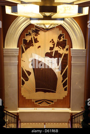 A painting of the ship is seen on board of the 'Queen Elizabeth' cruise ship in Hamburg, Germany, 29 April 2012. The luxury ship returned from a world trip to the port of Hamburg. Photo: Daniel Bockwoldt Stock Photo