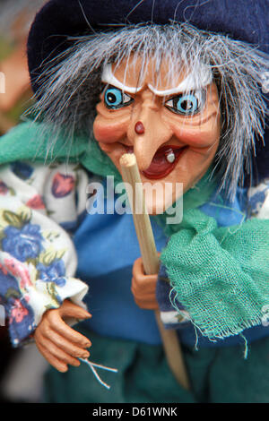 Witch dolls are sold as souvenirs in Thale, Germany, 13 April 2012. Walpurgis Night is a traditional spring festival on 30 April involving depictions of witches and devils. Almost every town in the Harz region has their own Walpurgis Night celebration on the night from 30 April to 01 May. Photo: Matthias Bein Stock Photo