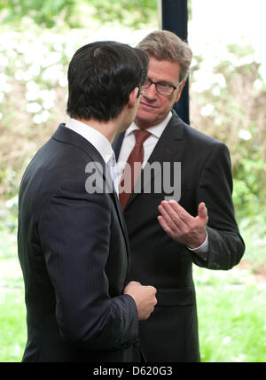 FDP chairman Philipp Roesler (L) and German Foreign Minister Guido Westerwelle meet prior to the committee meeting of the Free Liberals FDP in Berlin, Germany, 07 May 2012. Although FDP lost more than six percent compared to the last election in 2009 the party managed to enter the state parliament. Photo: JOERG CARSTENSEN