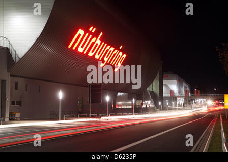 FILE - An archive picture dated 09 November 2011 shows the brightly illuminated Nuerburgring in Nuerburg, Germany. The committee on internal affairs of the state parliament of Rhineland-Palatinate meets on 10 May 2012 to discuss the state of the examnination process of the Eropean Commission on subsidies for the Nuerburgring and the fulfilment of contractual obligations of Nuerburg Stock Photo