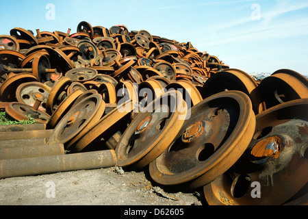 Woodhams of Barry Island train scrapyard in Wales in 1980 with pile of scrap wheels Stock Photo