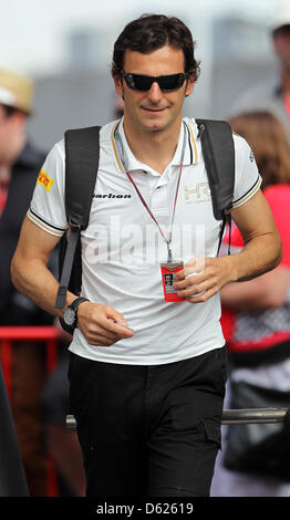 Spanish Formula One driver Pedro de la Rosa of HRT arrives at the paddock at the Circuit de Catalunya in Montmelo near Barcelona, Spain, 13 May 2012. The Grand Prix of Spain will take place here on Sunday 13 May. Foto: Jan Woitas dpa Stock Photo