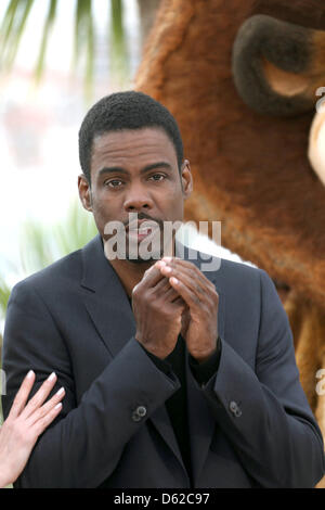 Actor Chris Rock poses to promote the film 'Madagascar 3: Europe's Most Wanted' during the 65th Cannes Film Festival at Palais des Festivals in Cannes, France, on 18 May 2012. Photo: Hubert Boesl Stock Photo