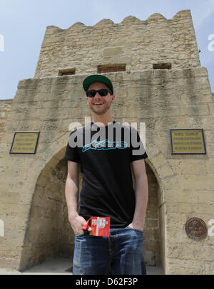 German singer Roman Lob visits a temple in Baku, Azerbaijan, 21 May 2012. Lob will perform at the Eurovision Song Contest on 26 May 2012. Photo: Joerg Carstensen Stock Photo