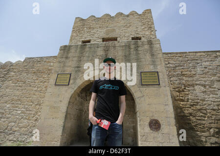 German singer Roman Lob visits a temple in Baku, Azerbaijan, 21 May 2012. Lob will perform at the Eurovision Song Contest on 26 May 2012. Photo: Joerg Carstensen Stock Photo