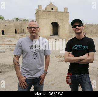 German musician Thomas D (L) and singer Roman Lob visits a temple in Baku, Azerbaijan, 21 May 2012. Lob will perform at the Eurovision Song Contest on 26 May 2012. Photo: Joerg Carstensen Stock Photo