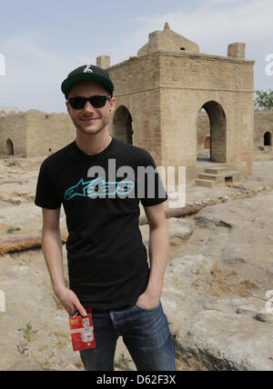 German singer Roman Lob visits a temple in Baku, Azerbaijan, 21 May 2012. Lob will perform at the Eurovision Song Contest on 26 May 2012. Photo: Joerg Carstensen Stock Photo