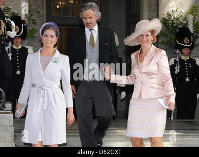 Princess Madeleine of Sweden (L), Princess Maertha Louise (R) of Norway and her husband Ari Behn leave after the christening of the Swedish Princess Estelle at the Royal Chapel (Slottskyrkan) in Stockholm, Sweden, 22 May 2012. The daughter of Crown Princess Victoria and Prince Daniel of Sweden was born on 23 February 2012. Photo: Britta Pedersen dpa Stock Photo