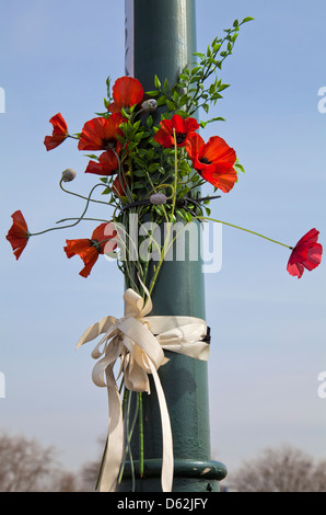 Poppies on pole - Roadside Accident Stock Photo