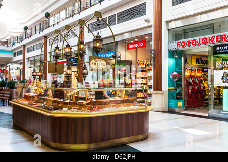 A confectionary stall inside the Arkadia shopping mall, largest in central Europe, in Warsaw, Poland. Stock Photo