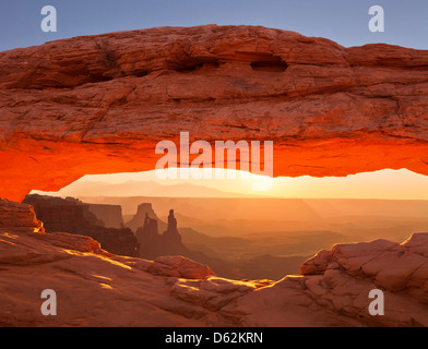 Sunrise over La Sal Mountains, Washer Woman Arch, and Mesa Arch, Island in the Sky, Canyonlands National Park, San Juan County, Utah, USA Stock Photo