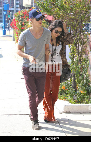 Vanessa Hudgens and boyfriend Austin Butler show some affection while out and about in West Hollywood Los Angeles, California - Stock Photo