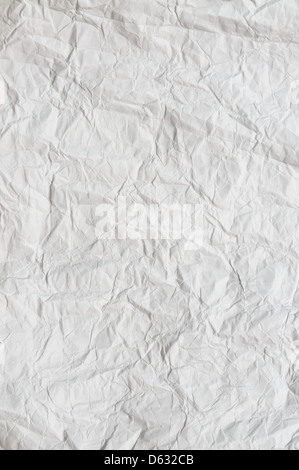 A crumpled whit paper texture for background use Stock Photo