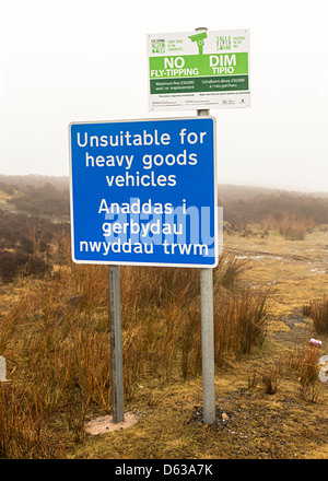 Sign on remote road unsuitable for heavy goods vehicles and no tipping in Welsh and English, Blorenge mountain, Wales UK Stock Photo