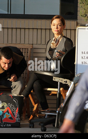 Rose McGowan leaving Barneys New York store in Beverly Hills Los Angeles, California - 21.12.11 Stock Photo