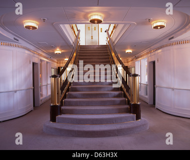The staircase on the Royal Yacht Britannia, moored at Ocean Terminal in Leith, Edinburgh, and now a visitor attraction. Stock Photo