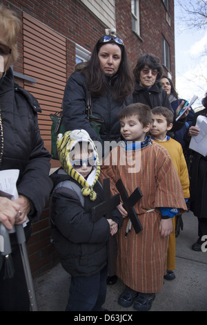 Children's Stations of the Cross procession through Williamsburg, Brooklyn, NYC Stock Photo