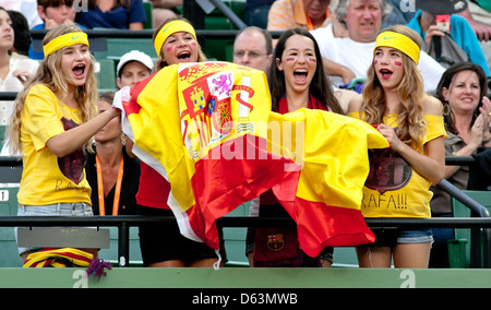 Fans of Rafael Nadal (ESP) show their support as he competes against Tomas Berdych (CZE) during the Sony Ericsson Open at Stock Photo