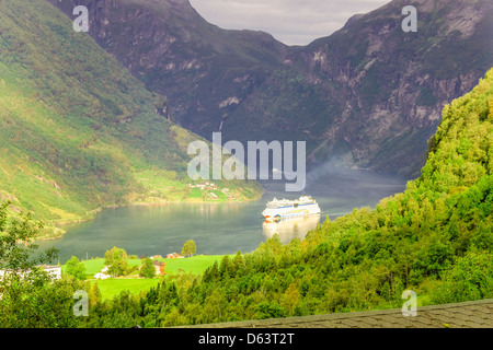 Cruise ship in Geiranger fjord Stock Photo