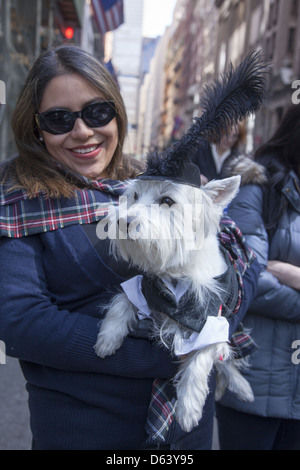 Scottish bagpipers, dancers, marchers and onlookers enjoy the annual Tartan Day Parade on 6th Ave. in New York City Stock Photo