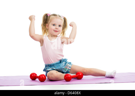 Child girl doing exercises with weights Stock Photo