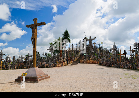 view on hill of crosses in lithuania with blue cloudy sky Stock Photo